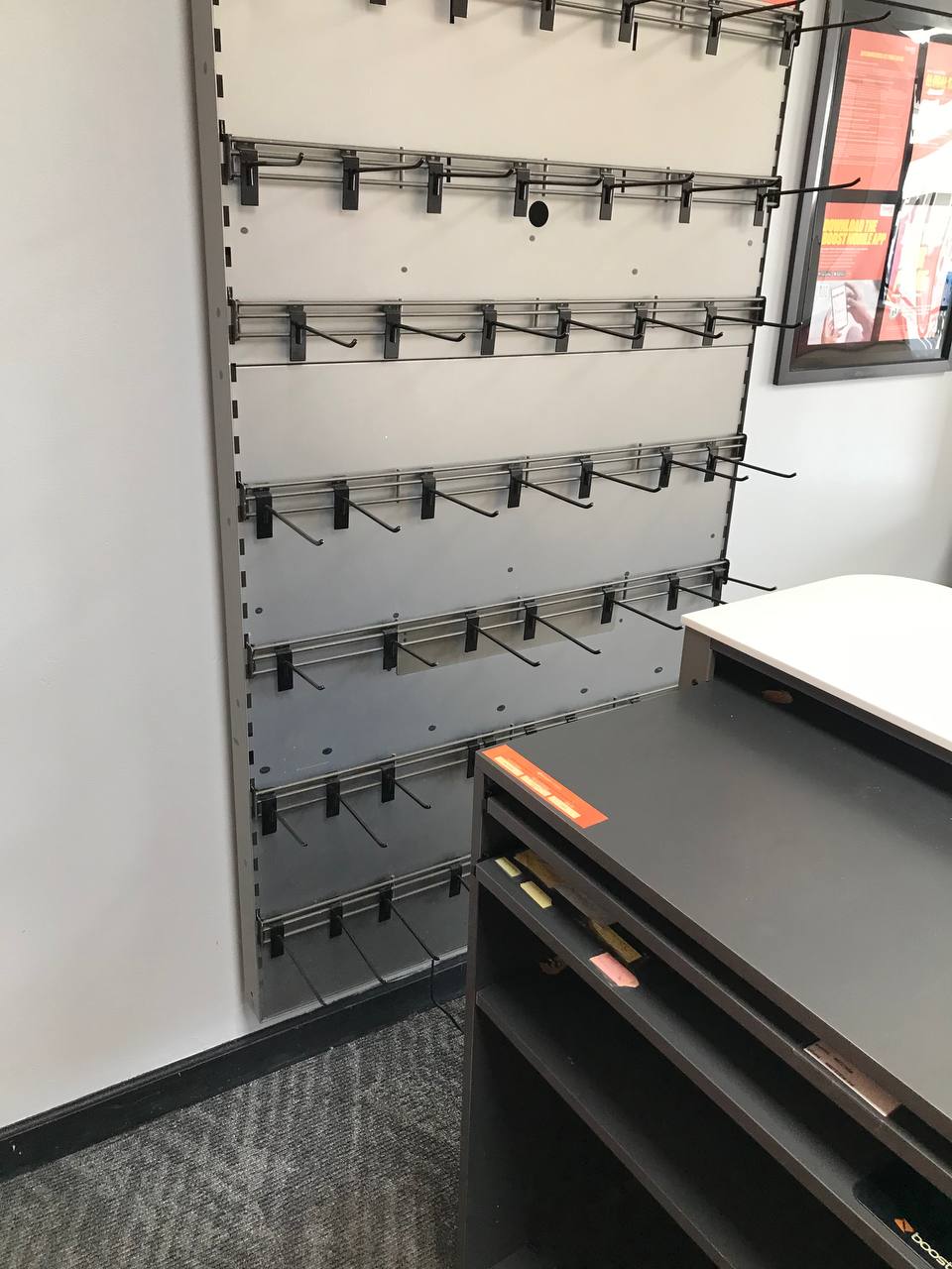 Slat wall display panels stripped from a retail store wall
